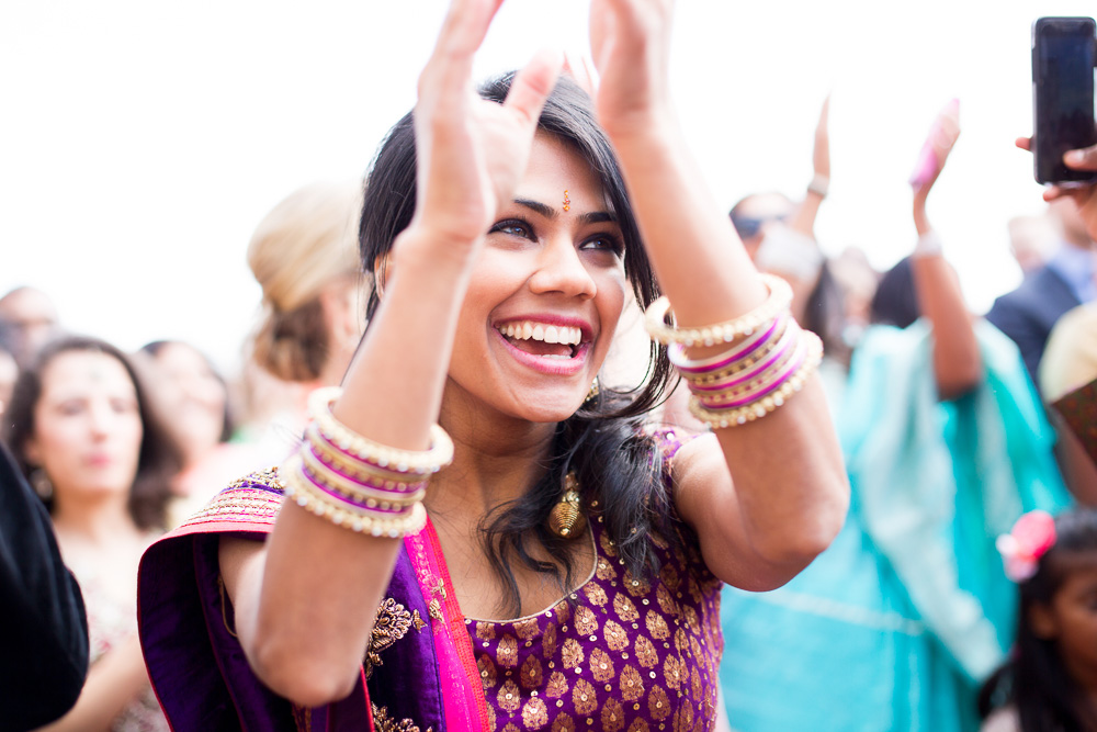 stunning indian woman dancing at the wedding
