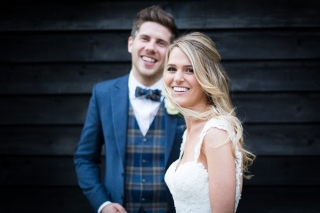 portrait of the bride and groom at The old Kent Barn wedding