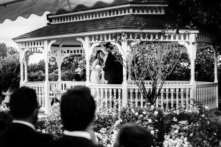 black and white shot of laughing bride at The old Kent Barn