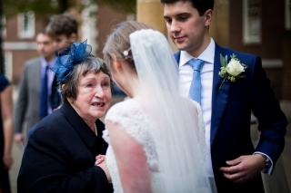 grandmother congratulating her grandaughter on her wedding day