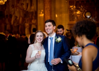 happy bride and groom laughing at One whitehall place
