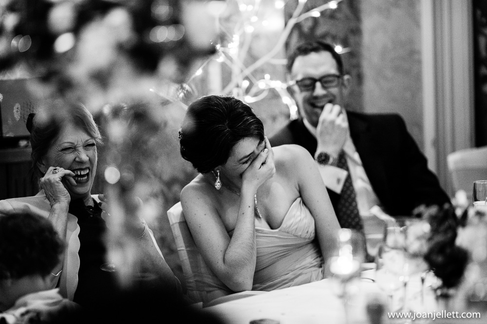 Bridesmaid laughing