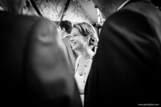 black and white shot of bride laughing