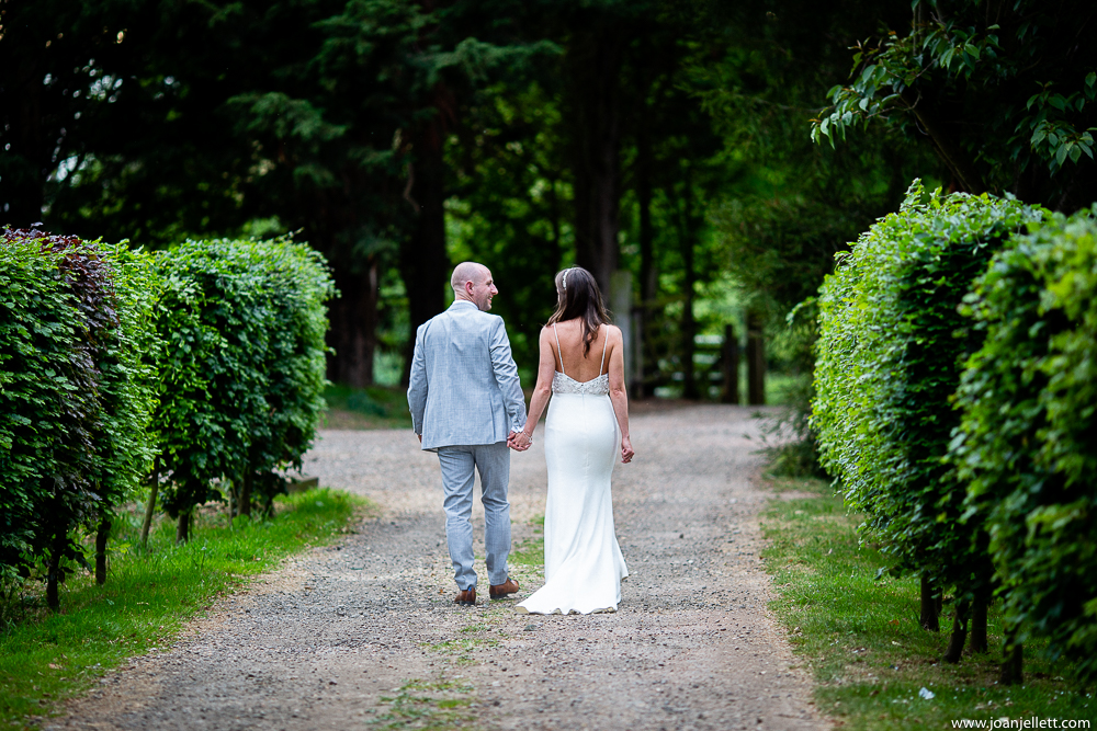 bride and groom taking a walk