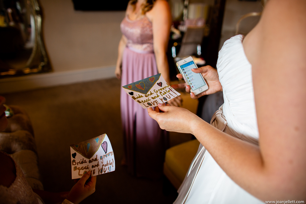 bride reading a note from her daughters