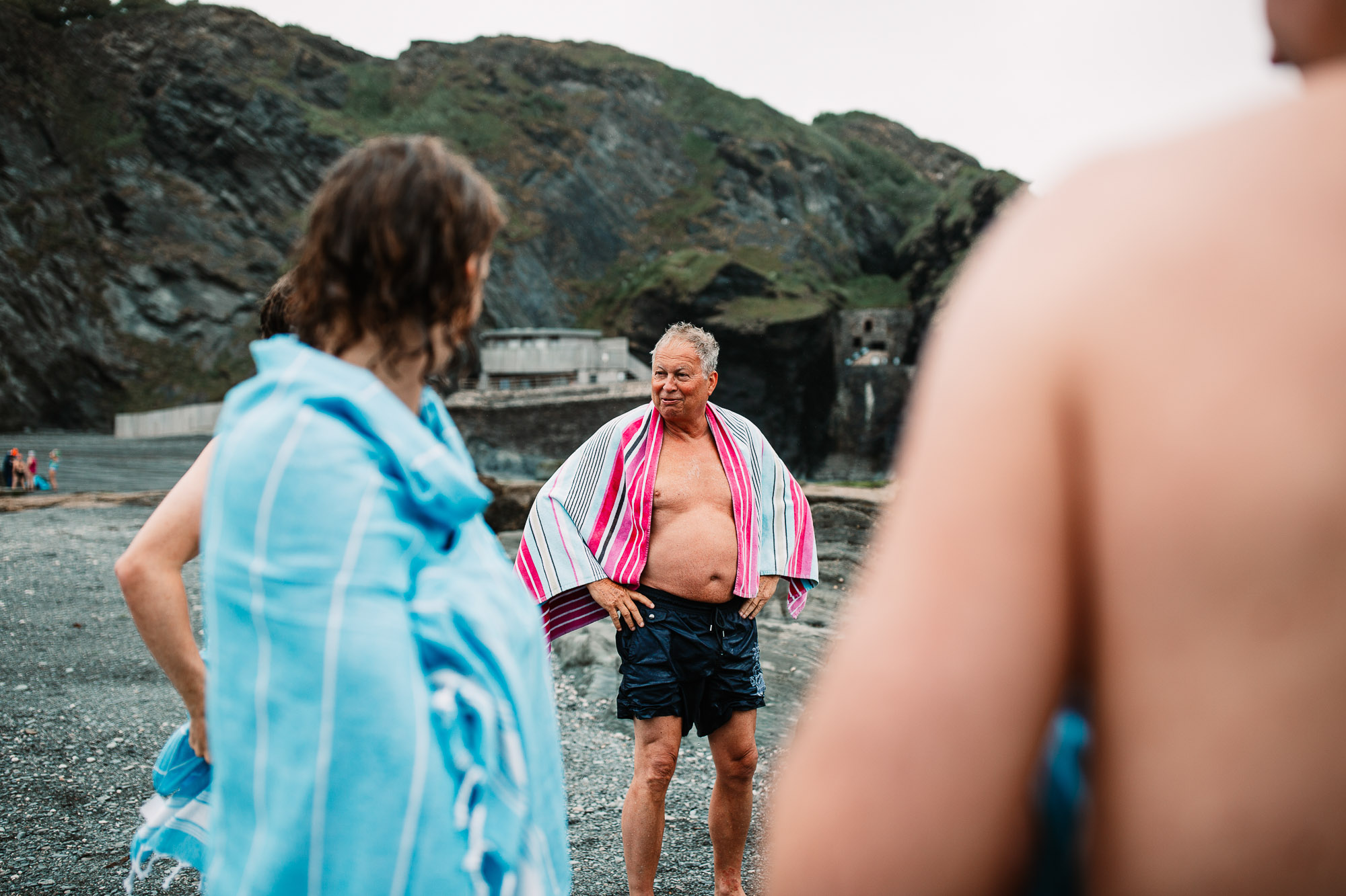 father of the groom in a towel after a swim at tunnels beaches