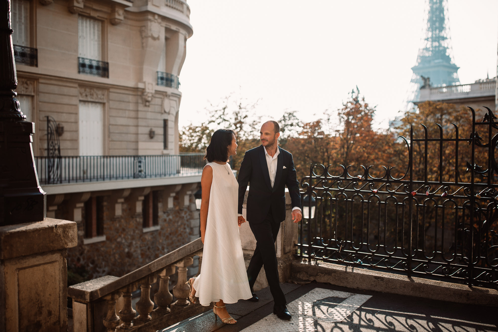 bride and groom looking at each-other in Paris