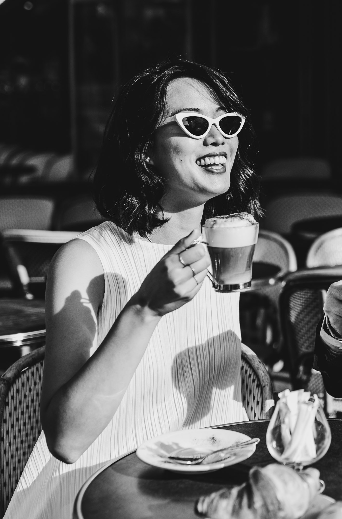 Parisian woman drinking a coffee
