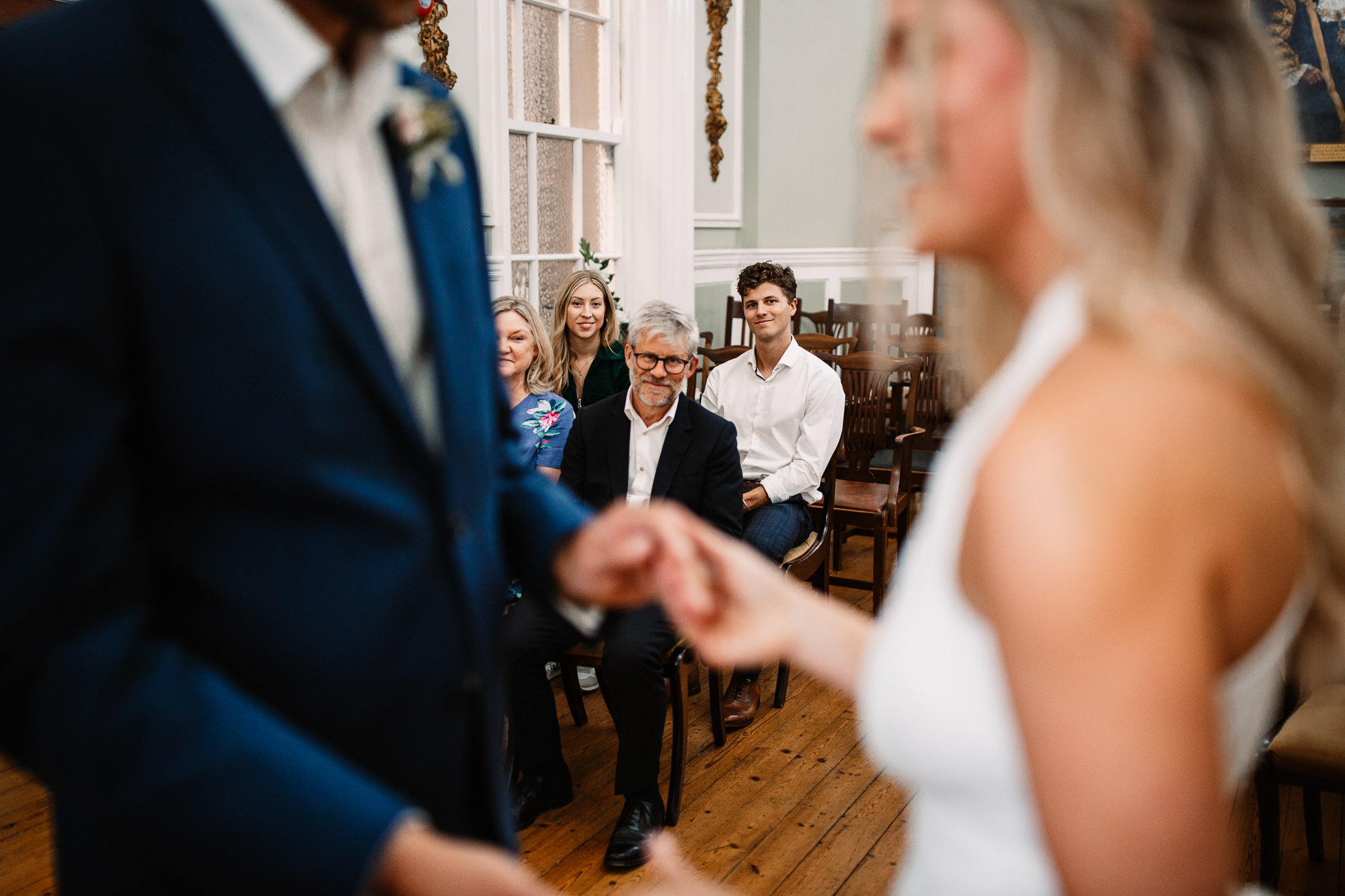 father of the bride getting emotional looking at his daughter getting married
