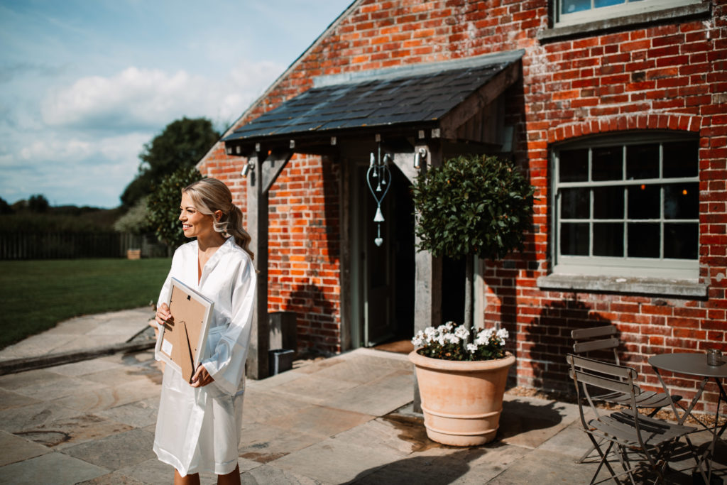 bride awaiting her guests at sopley mill