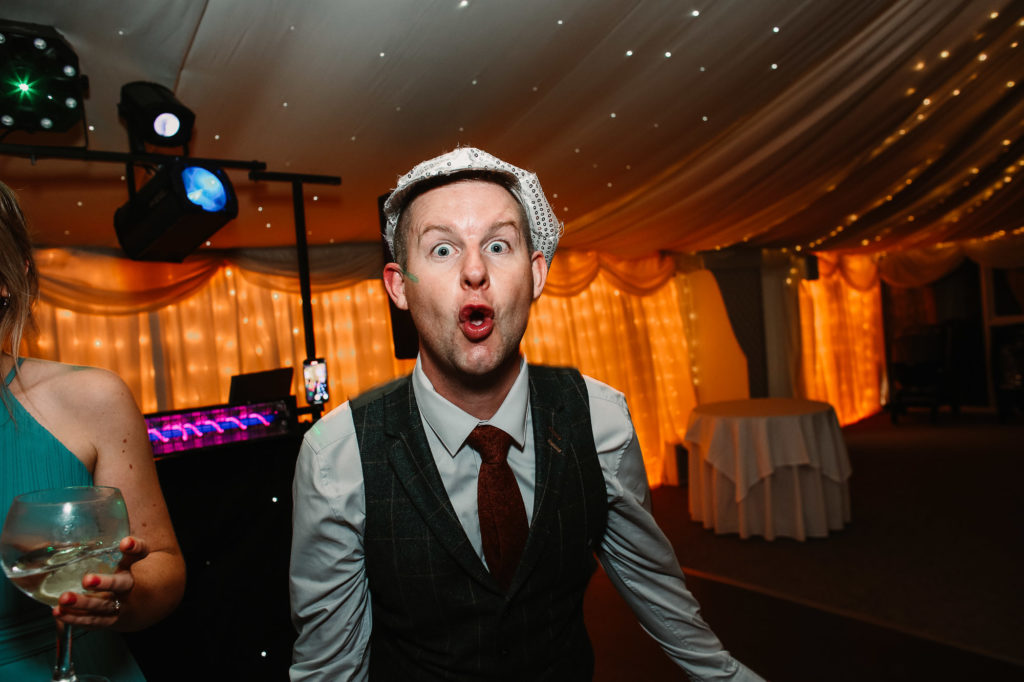 guest pulling a silly face on the dancefloor