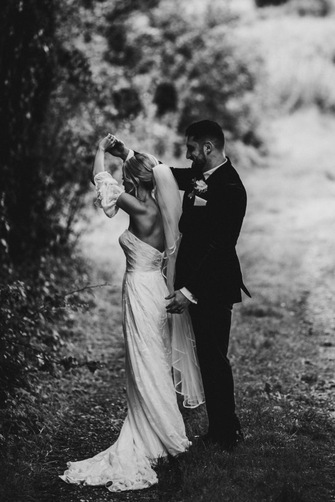 black and white bride and groom dancing