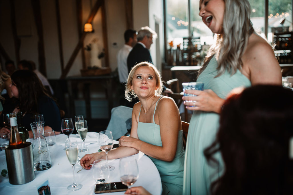bridesmaid looking at other bridesmaid with love and affection