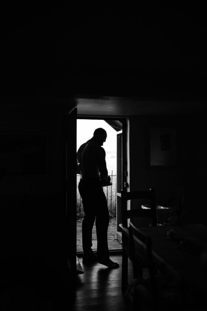 silhouette shot of the groom