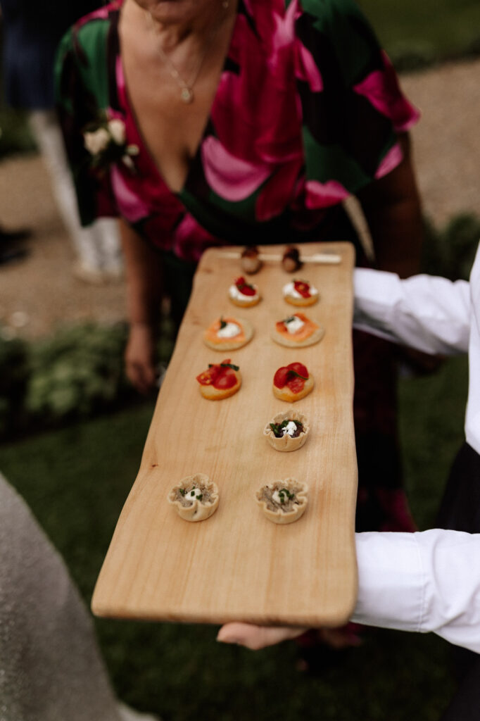 canapés being presented to guests at deans court
