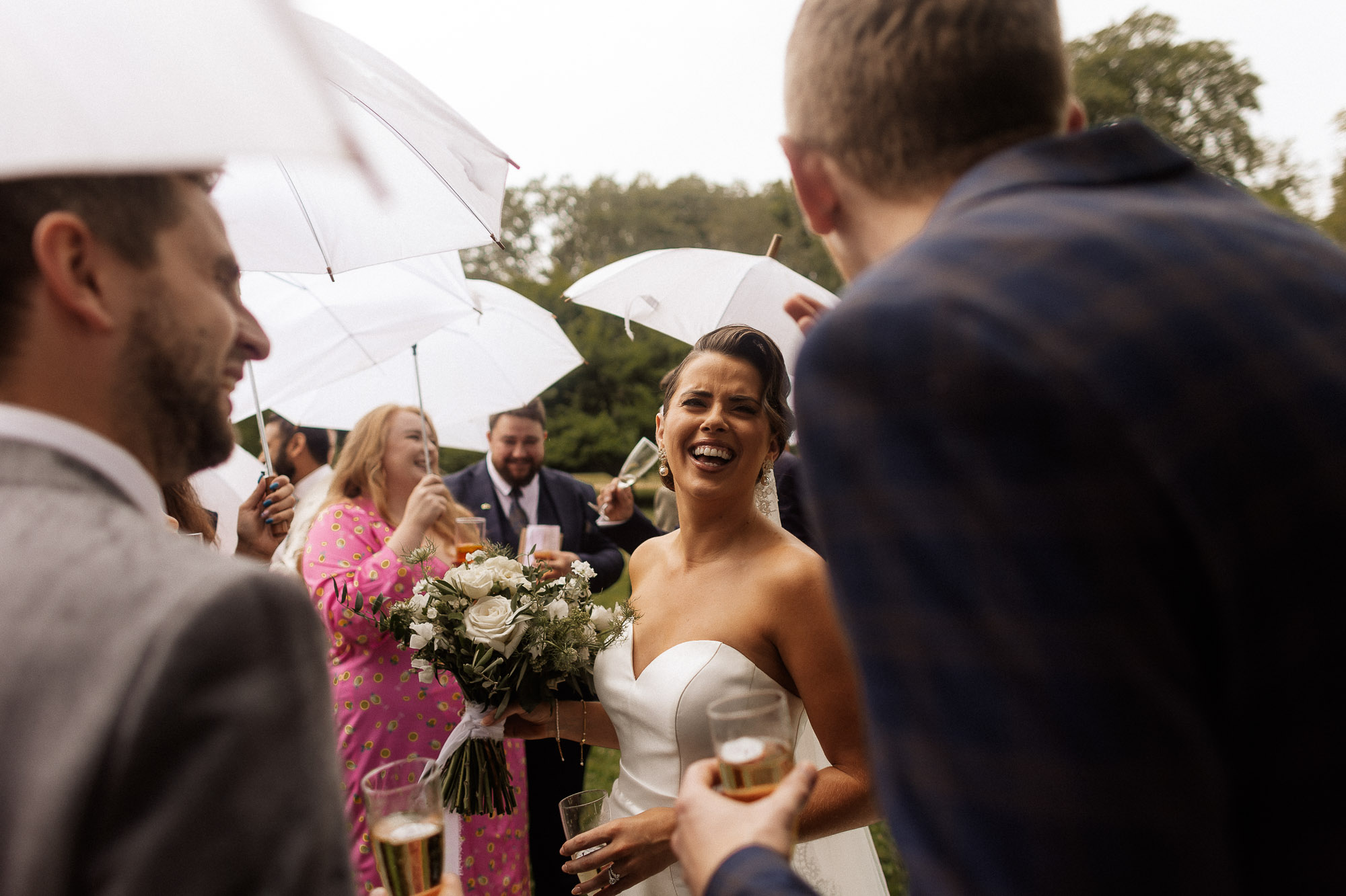 candid shot of bride laughing during cocktail hour